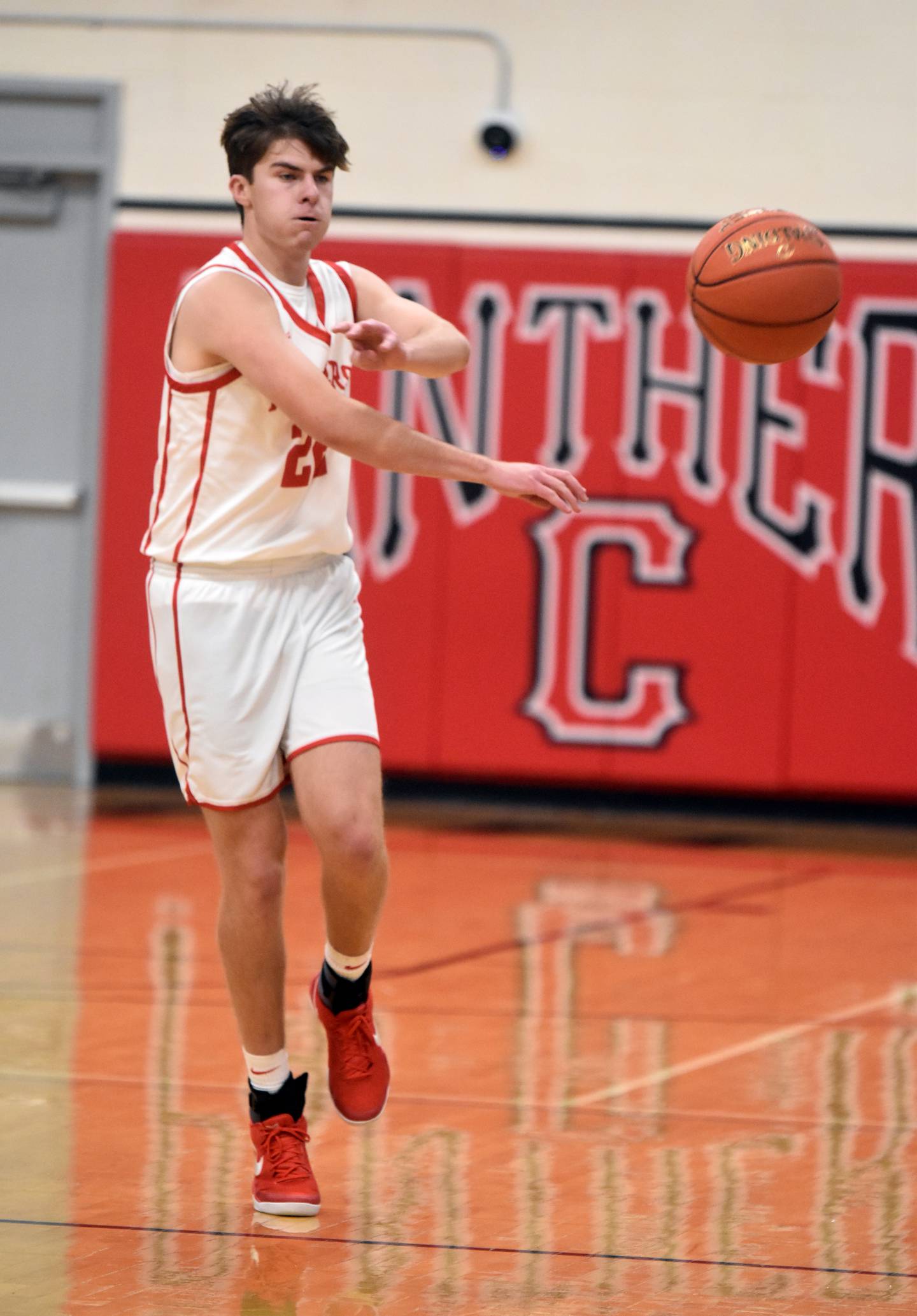 Parker Varner makes a pass to a teammate. Varner logged 11 points and a team-high six rebounds.