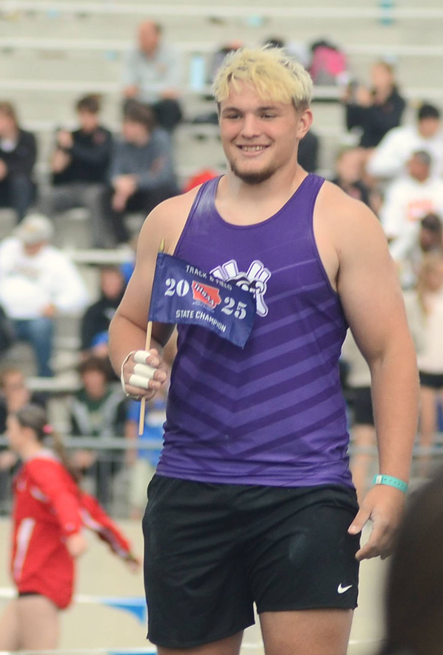 Trenton Warner of Nodaway Valley is introduced as Class 1A shot put champion with a throw of 53-11.75. Warner also placed fifth in the discus.