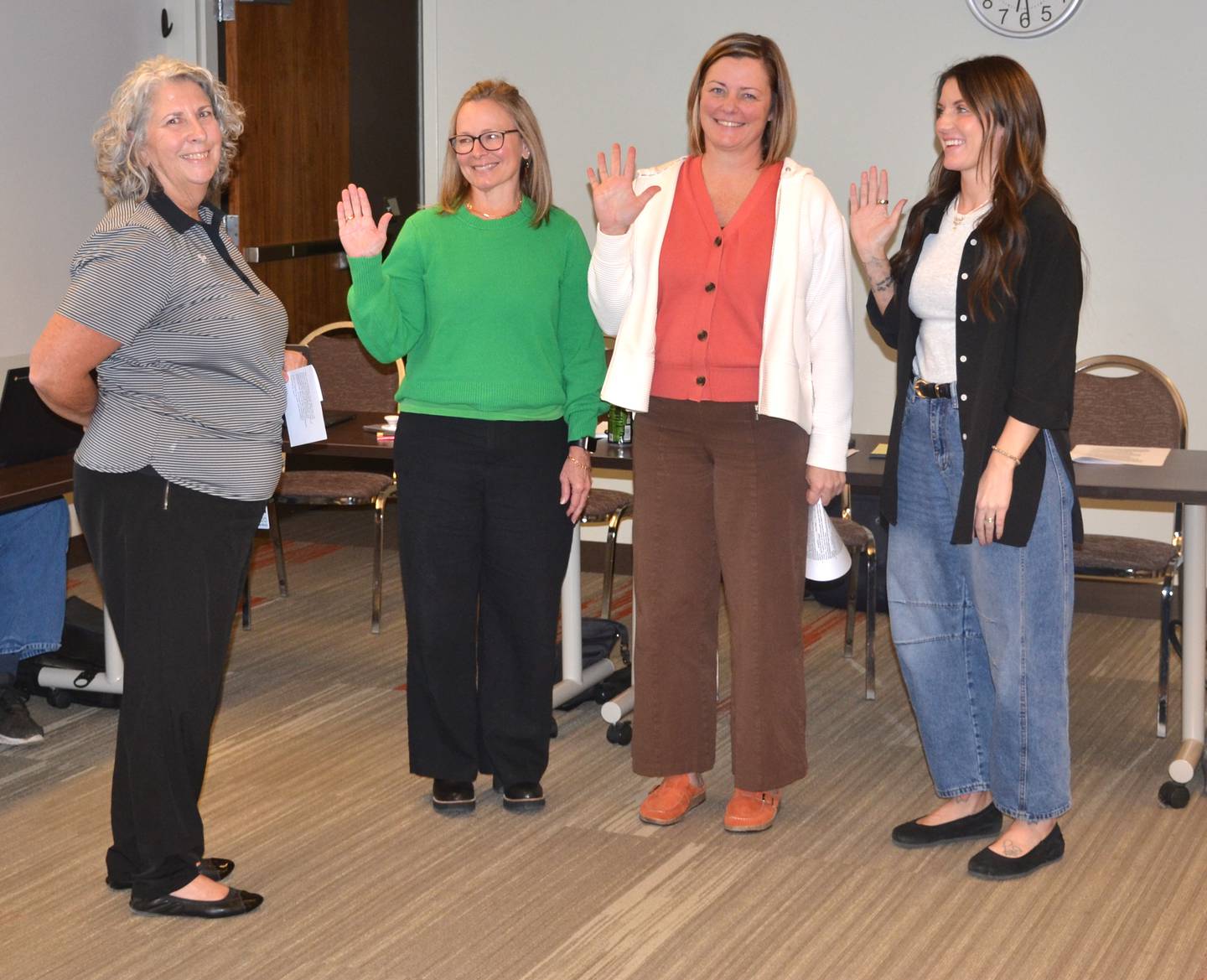 CCSD Business Manager Billie Jo Green swears in the winners of the November school board elections. From left: Kathy Thorne Ralston, Amanda Mohr and MaKenzi Vonk.