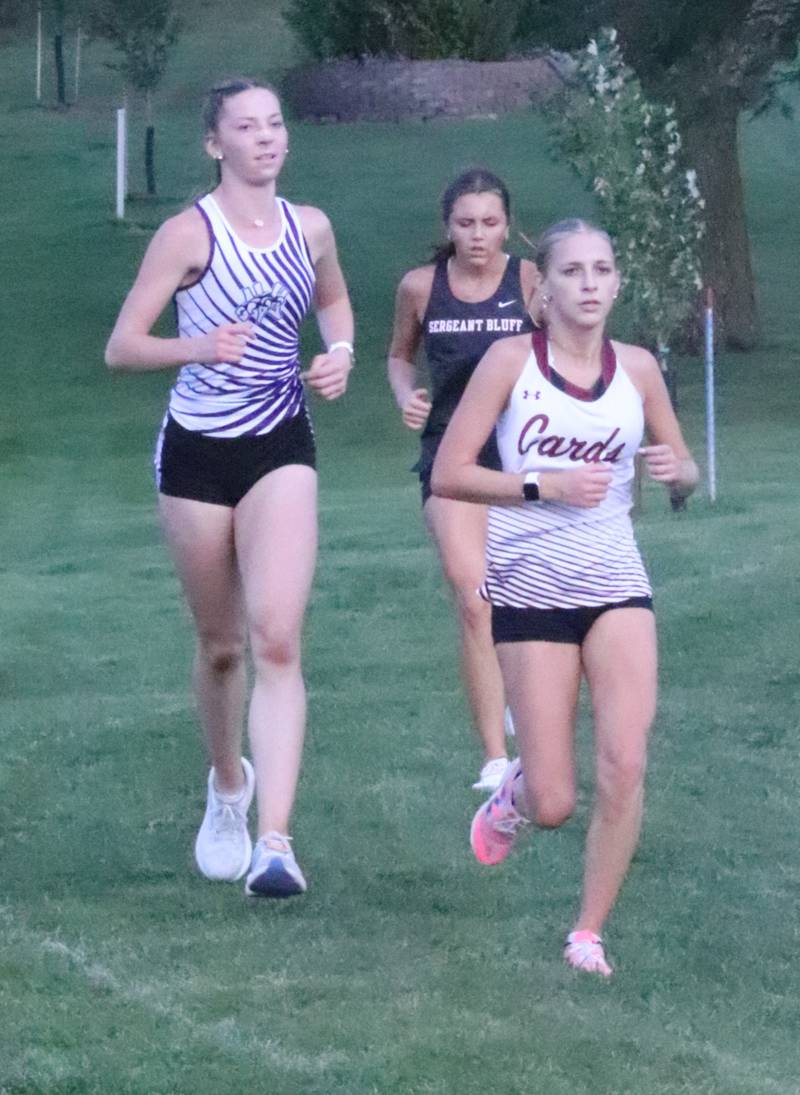 NV/OM freshman Abby Nelson runs in a pack of competitors at the Atlantic Trojan Invitational.