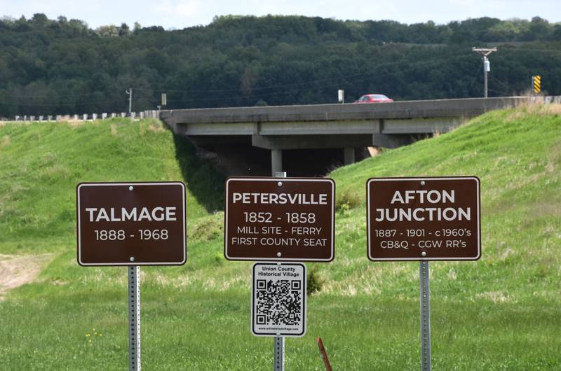 Three abandoned Union County towns have their signs located together off of Highway 34.