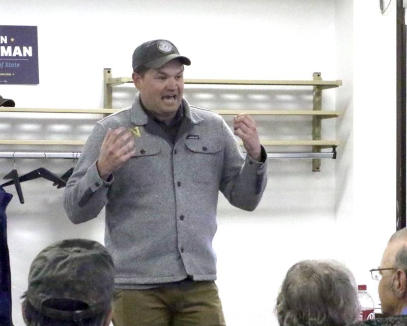 Ryan Peterman, a Quad Cities native running for Iowa Secretary of State as a Democrat against Republican incumbent Paul Pate, speaks last Saturday at The Gathering Place.