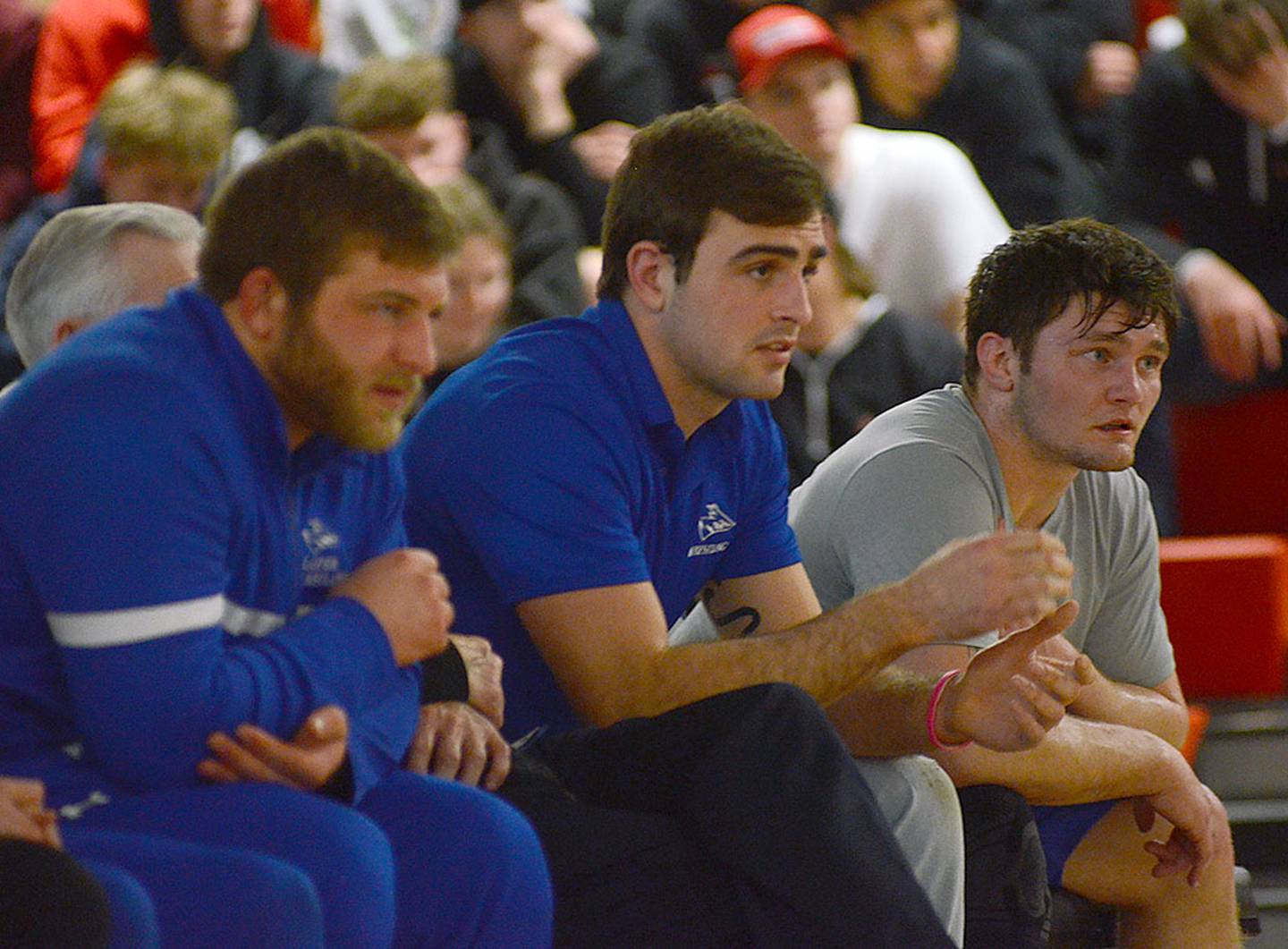 Nebraska-Kearney 197-pound wrestler Jackson Kinsella watches his teammate, heavyweight Crew Howard of Clarinda, win a 5-2 match at Grand View in a battle of NCAA D-II and NAIA top-ranked wrestlers.
