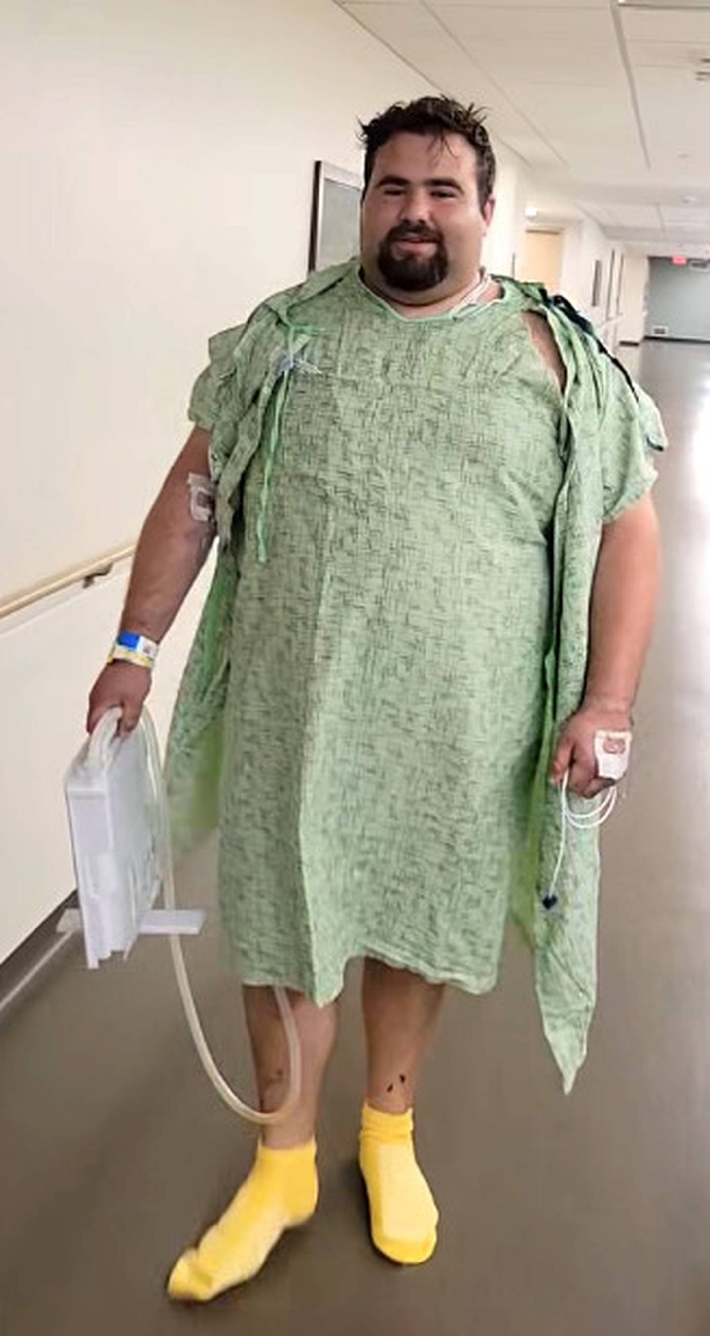 Three days after the accident, Knox takes his first walk around the hospital in Omaha.