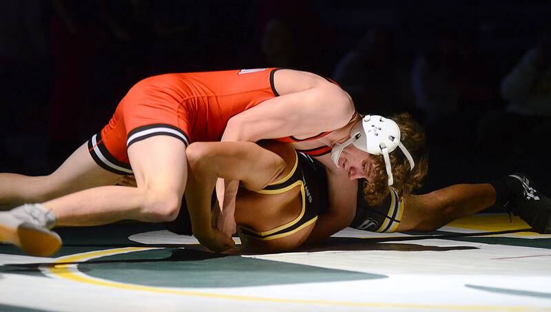 Joshua Bunz of Creston turns Saydel's Adrian Vega-Munoz on the way to earning a win by fall in 1:45 at 150 pounds Thursday night.