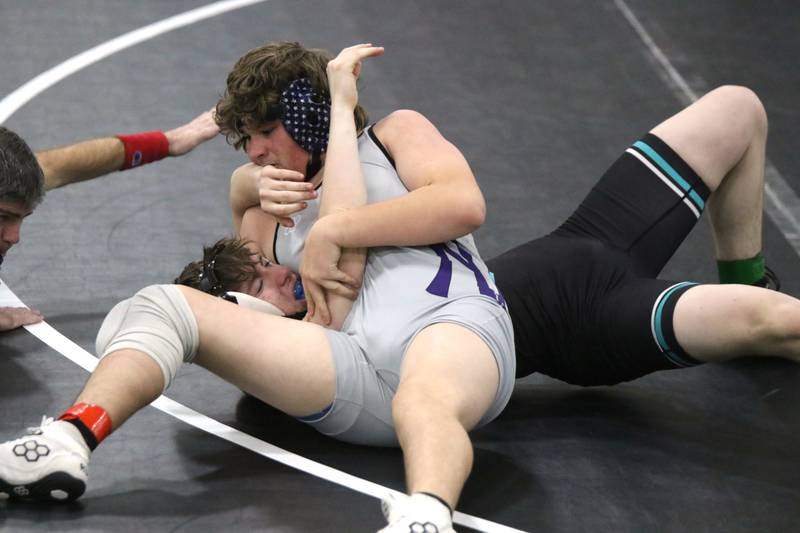 Nodaway Valley's Silas Pieken gets nearfall points, with Southwest Valley's Lucas James on his back, during their 175-pound match Thursday in Corning. Pieken, who had only wrestled once at the varsity level this season, stepped in with two big pins that night to help his team tremendously.
