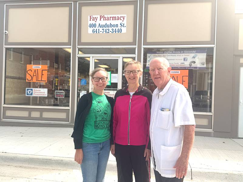 From left, Tiffany, DeElta and Peter Fay in front of Fay Pharmacy, which has been in operation since 1977. It will close Sept. 24.
