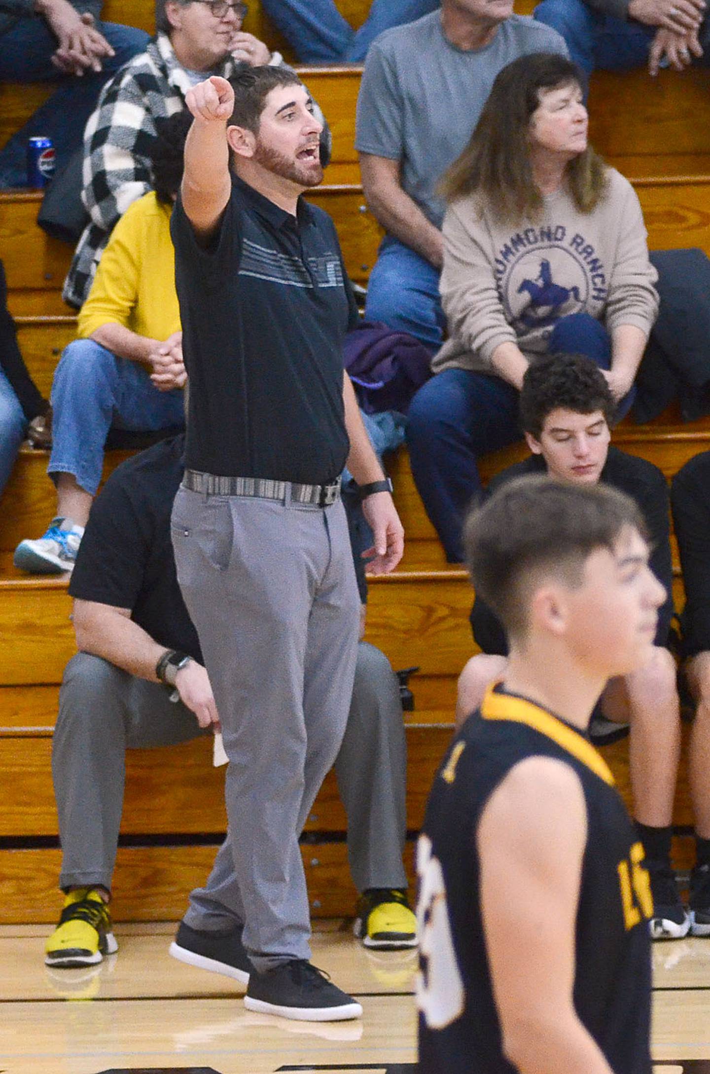 Lenox boys basketball coach Michael West directs his team during Tuesday's game at Nodaway Valley.