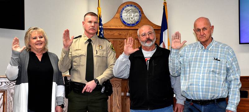 Union County Auditor Sandy Hysell, sheriff Brian Bolton and supervisors Rick Friday and Dennis Brown are sworn in to office Monday for four-year terms. Bolton was the only one who is not an incumbent.