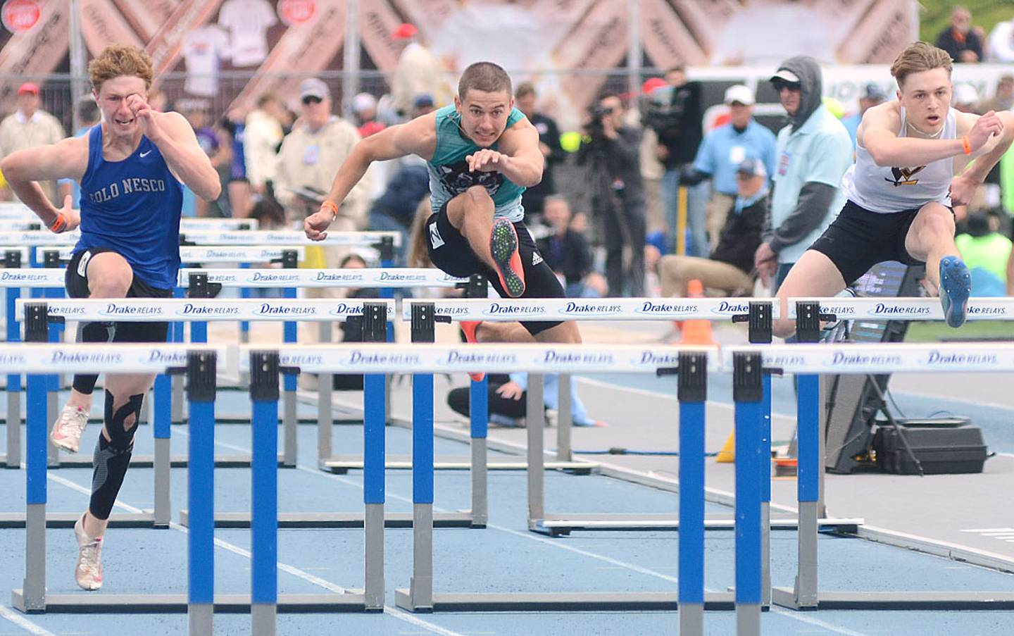 Wyatt Mendenhall of Southwest Valley (center) competes in the 110 meter high hurdles preliminaries Friday morning. Mendenhall was 22nd in 15.97.