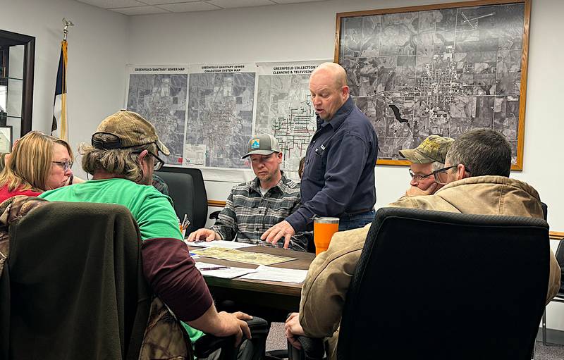 Greenfield Community Development President Scott Tonderum shows the Greenfield City Council a map at their Tuesday, Jan. 30 meeting that shows a proposed housing project for the town.