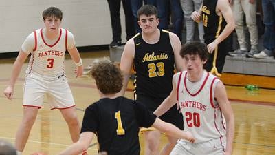 Late surge lifts Panthers over Trojans