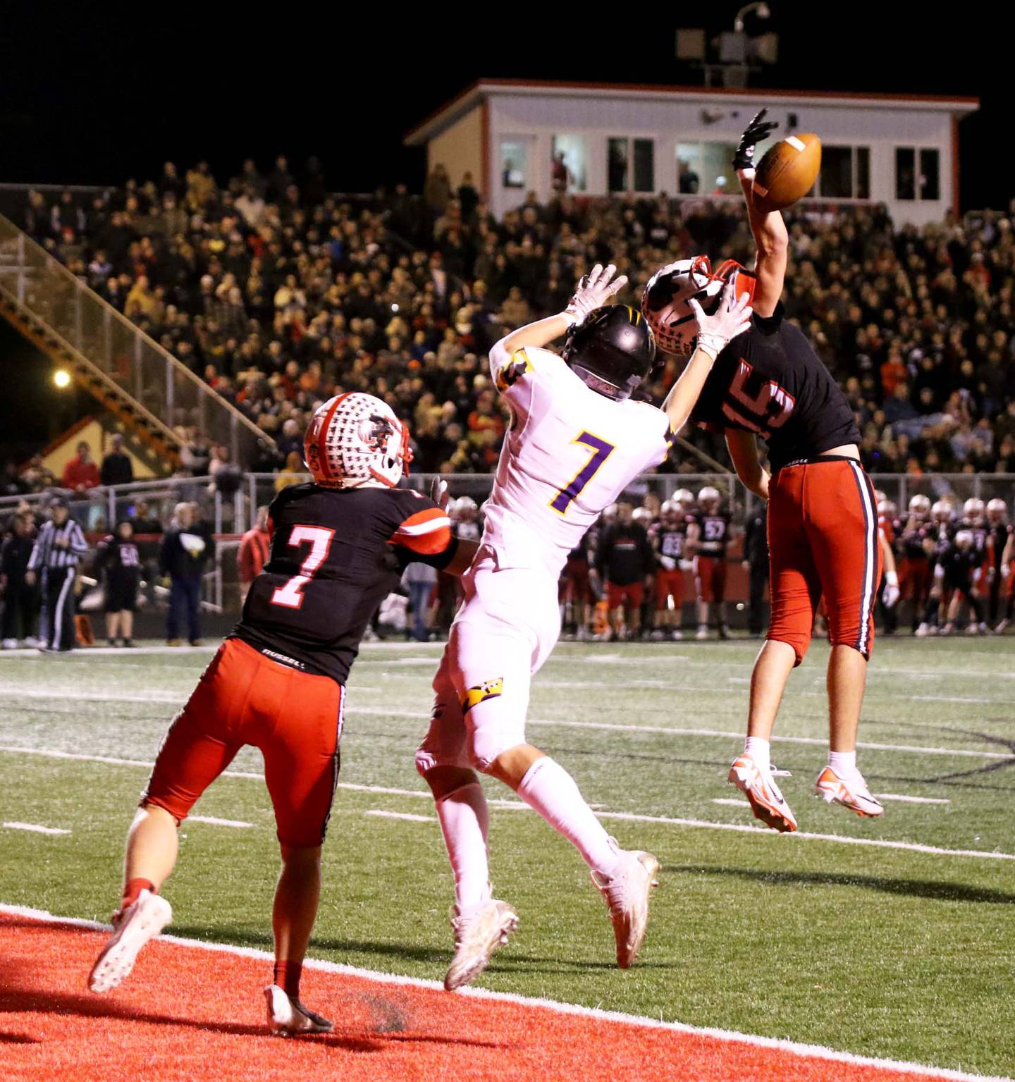 McCoy Haines (No. 15) gets a hand on the ball on a touchdown pass attempt to Briar Klaver on fourth-and-12 in the third quarter. Also defending is Jack Walter.