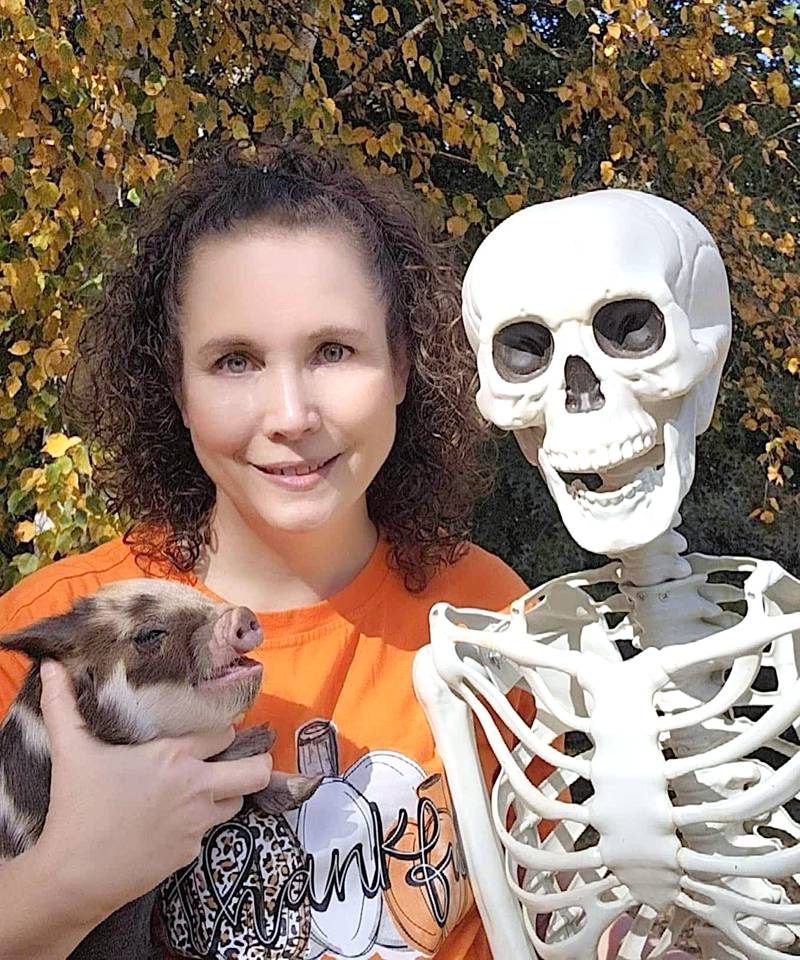 Sieanna Rawlings with her skeleton friend, George.