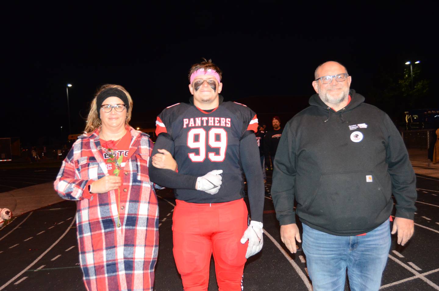 Max Chapman with parents Dena and Aaron