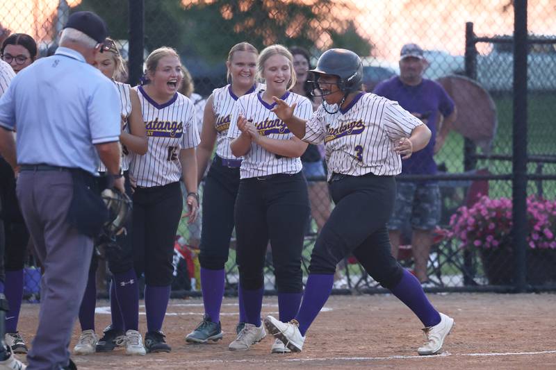 Karina Romero celebrates with her Murray teammates as she approaches home plate after hitting a grand slam home run Wednesday night against Lenox - her second home run of the game.