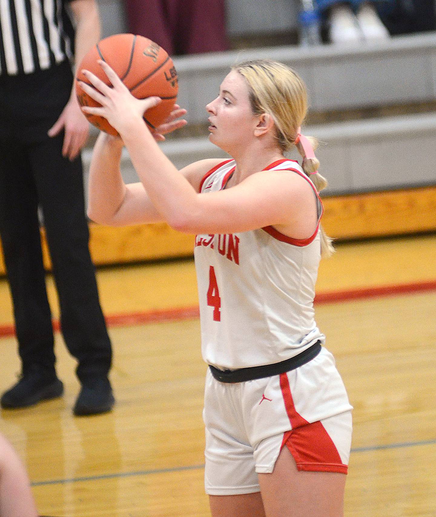 Jensan Tussey of Creston dribbles around a screen set by Braylee Pokorny (3). Tussey scored seven points in the victory. Pokorny grabbed 13 rebounds and scored five points.