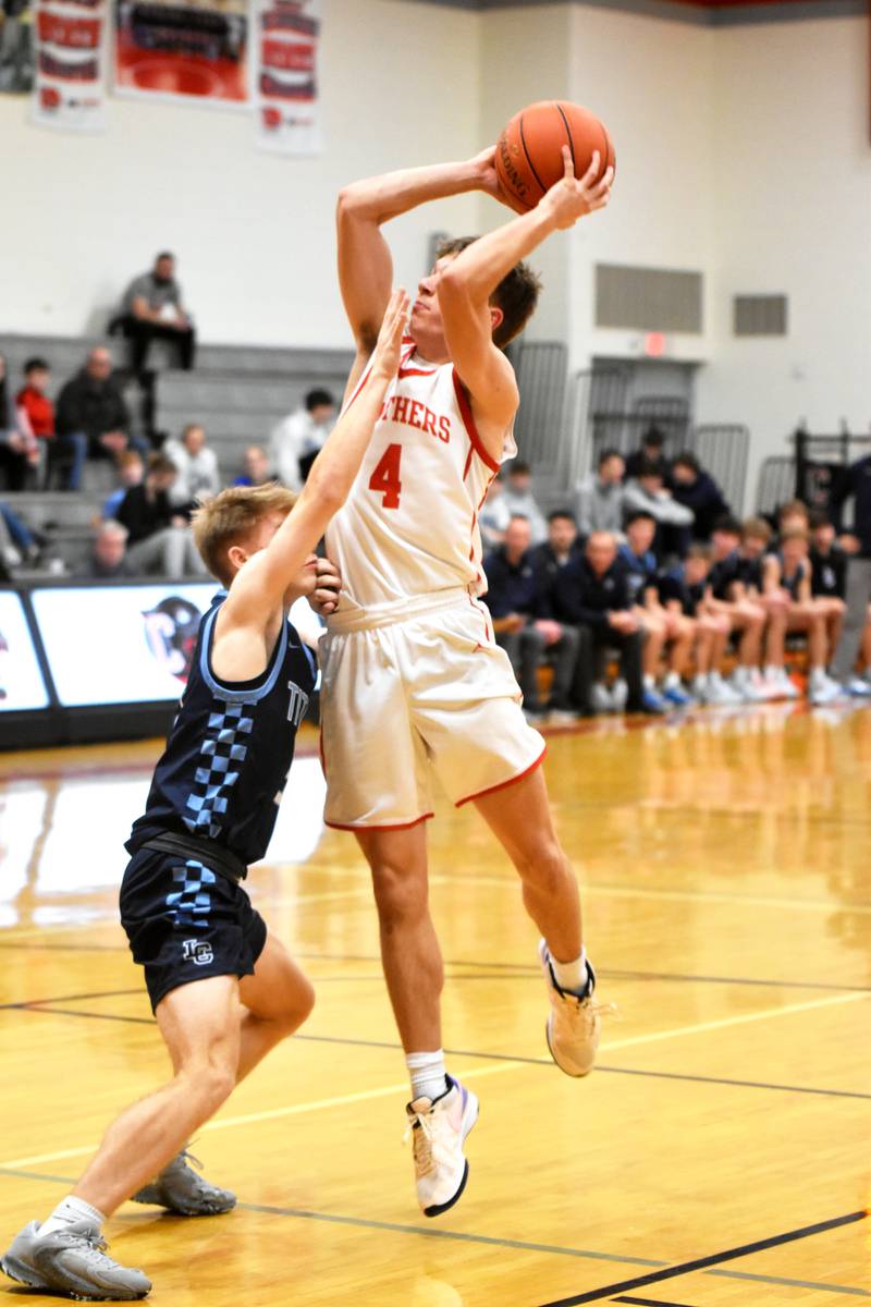 Sophomore Cael Barton puts up a contested shot. Barton had a career-best game where he logged 10 points on a 100% performance.