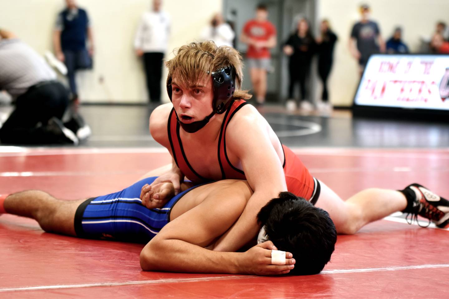 Colby Brammer works on top of Jose Lievano of Crestwood after making a comeback to win 11-9. Brammer placed fifth at 150 Saturday at the Creston Wrestling Invitational.