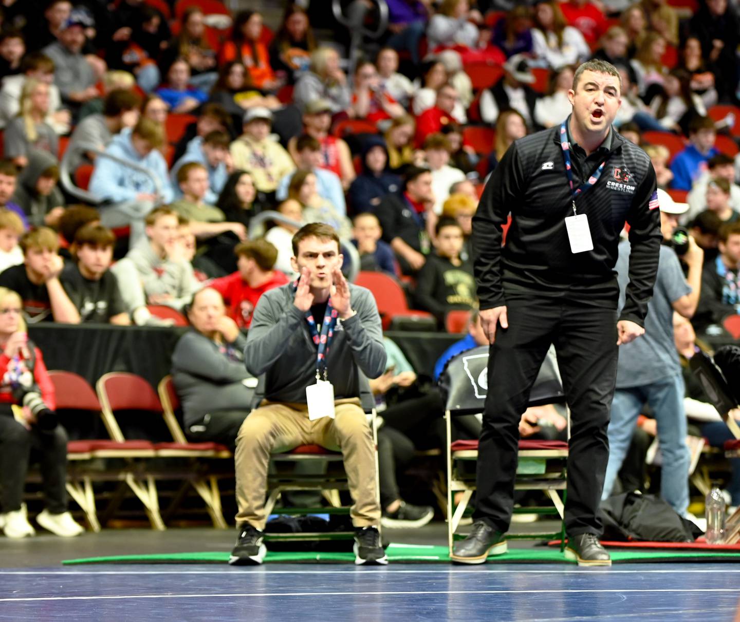 Creston coaches Kruz Adamson and Cody Downing direct during a match.