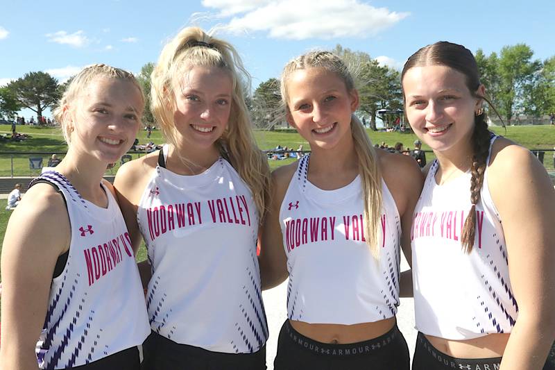 From left, coming together to win the sprint medley relay for Nodaway Valley were Maddie Weston, Izzy Eisbach, Annika Nelson and Emma Lundy.