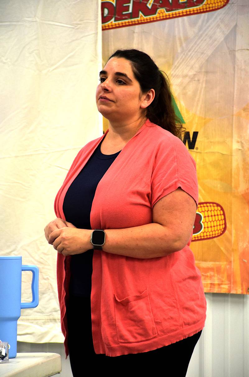 Iowa State University Extension's Sara Shonrock listens to a comment from the audience during her presentation Sept. 12 about county township duties.