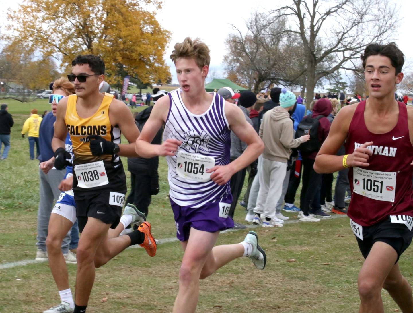 Wolverine junior Luke Kading goes toe to toe with the state's best during the state cross country meet Saturday at Lakeside Golf Course.