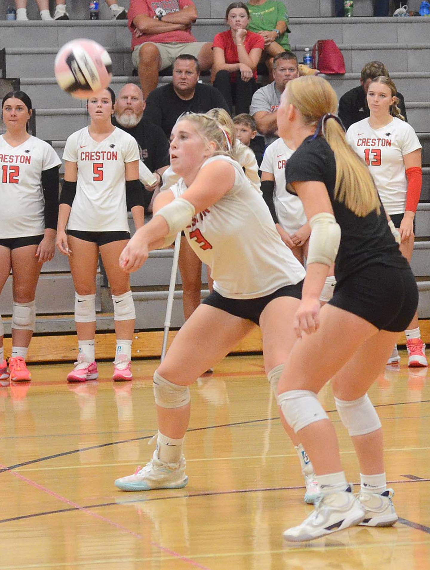 Creston's Jaycee Hanson passes from the back row during Tuesday's opener. Hanson ended with five kills for the Panthers.