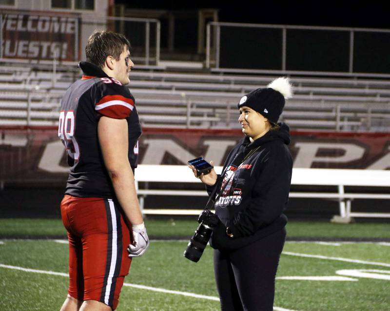 CNA sports reporter Cheyenne Roche gets postgame reactions from Max Chapman after a 50-27 comeback victory over Webster City in the Class 3A quarterfinals Friday.