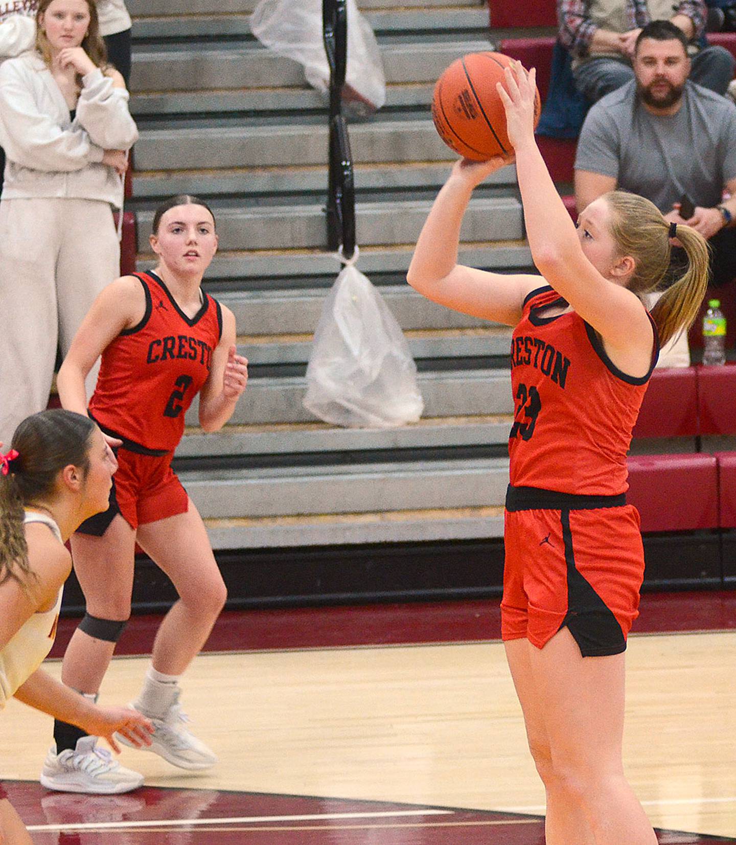 Brynn Tussey shoots against PCM Wednesday as Hollynn Rieck looks on.