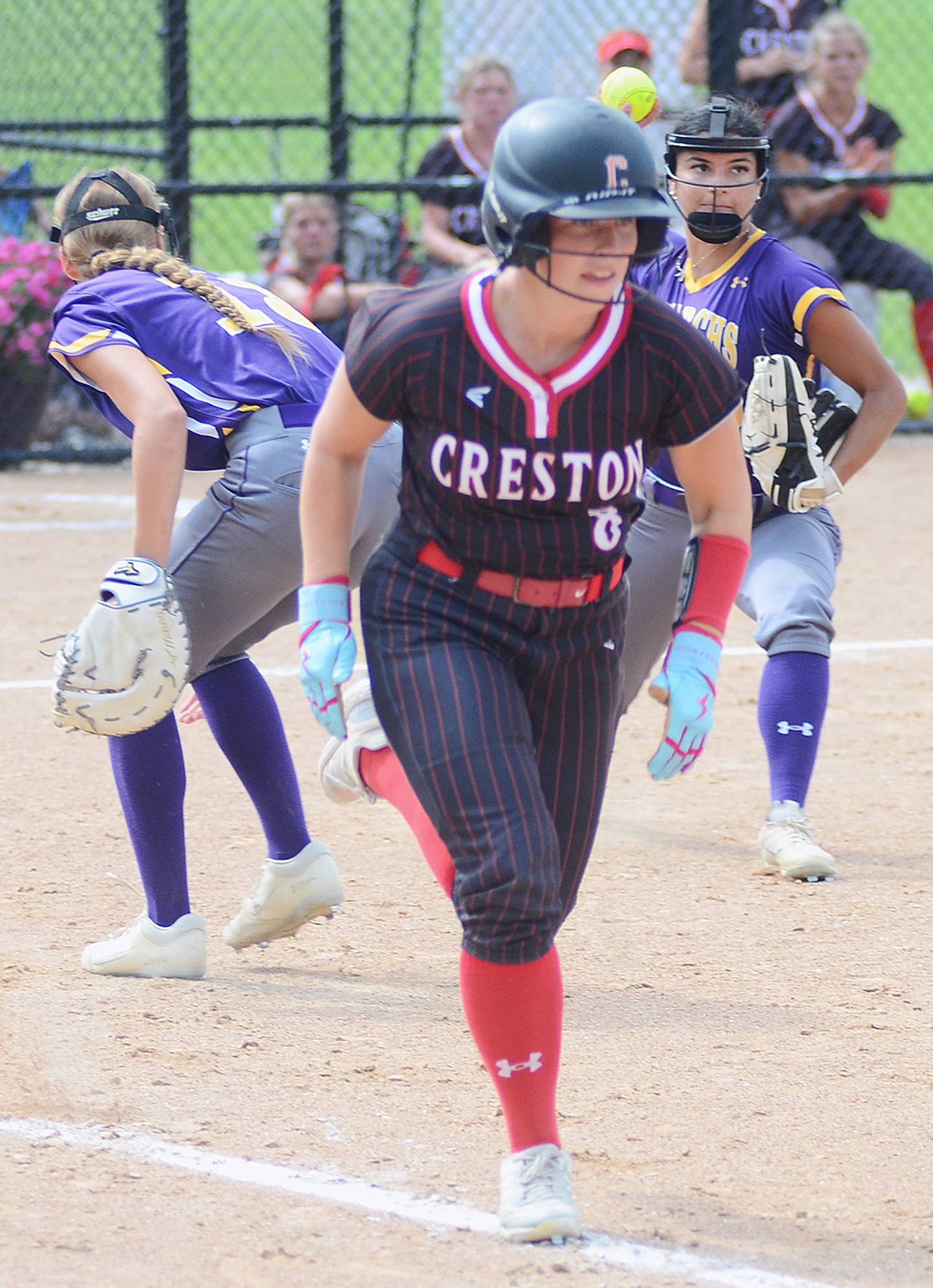 Creston's Jaycee Hanson runs to first base on a sacrifice bunt in the fifth inning of Friday's 10-5 win over Denison-Schleswig.