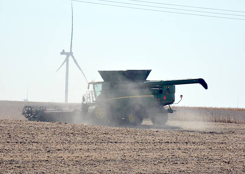 A farmer combines soybeans along the Adair-Union County line Sunday, Oct. 8.