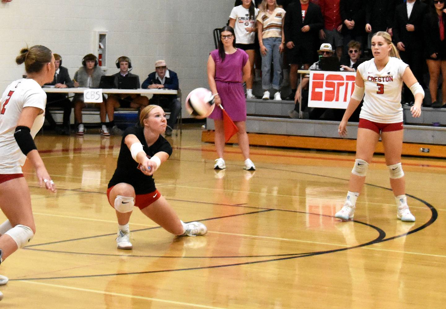 Creston senior libero Avery Staver digs up a serve Thursday in a 3-0 home loss to Red Oak. Staver had 11 digs in the Hawkeye 10 match up.