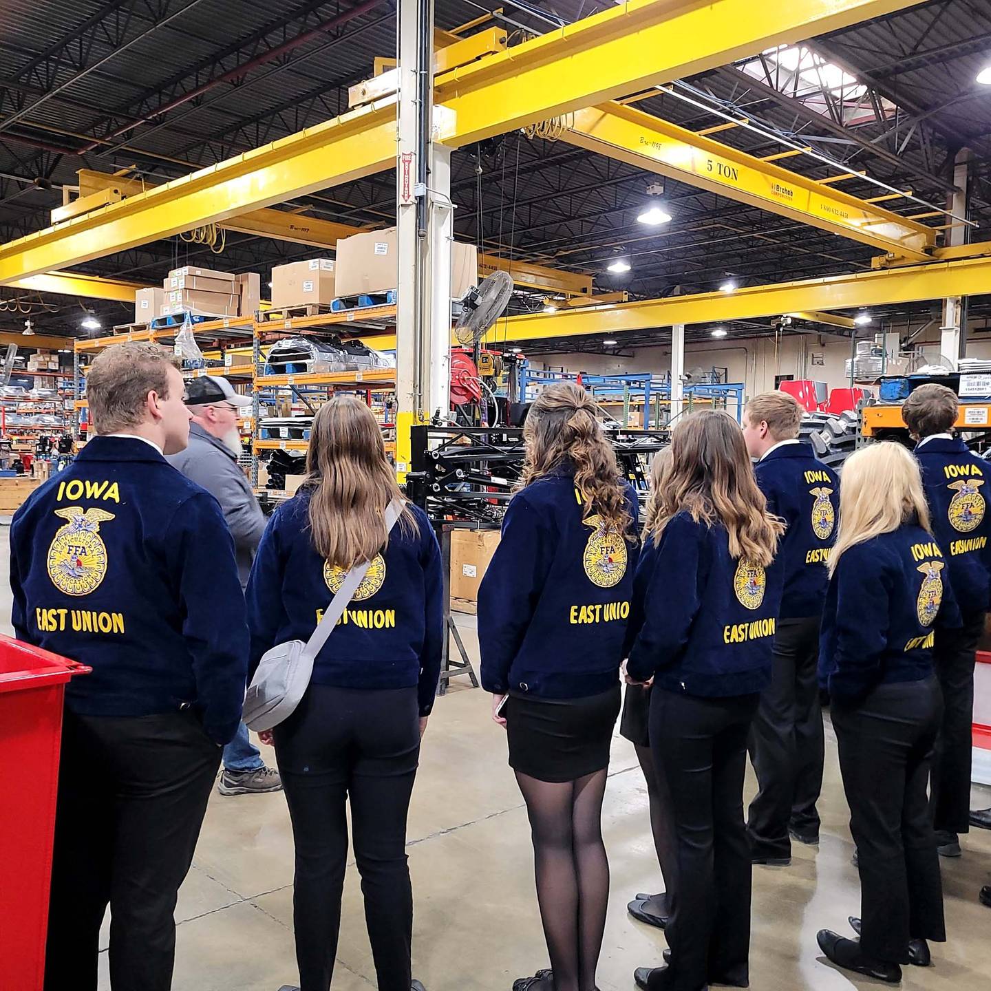 The students toured a sprayer facility.