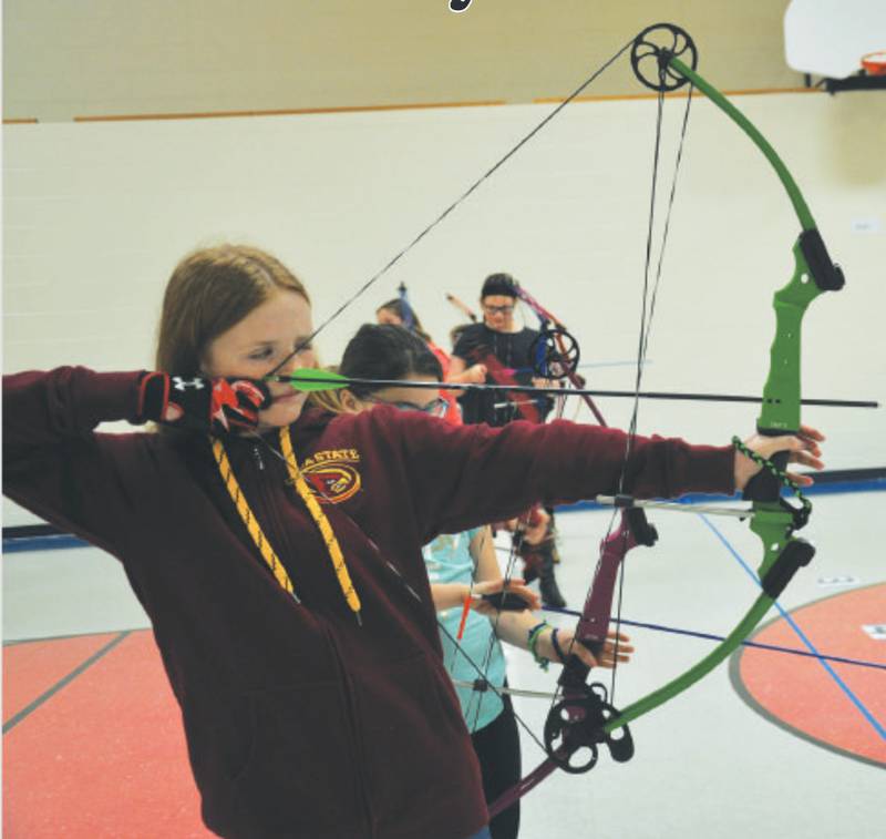 Creston Archery team member Hayden Ray sights down her arrow in preparation to fire a shot during practice Tuesday at the Early Childhood Center. Ray is one of 68 members of the Creston Archery team. The team, which started with 16 members, was established last year (2017).