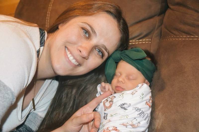 Anna Humburg poses with baby Willow soon after her birth.