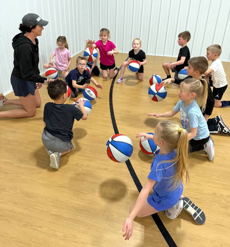 Kids play with basketballs in the gym at Adair's Boys and Girls Club of Central Southwest Iowa. The organization will soon be opening a Greenfield location.