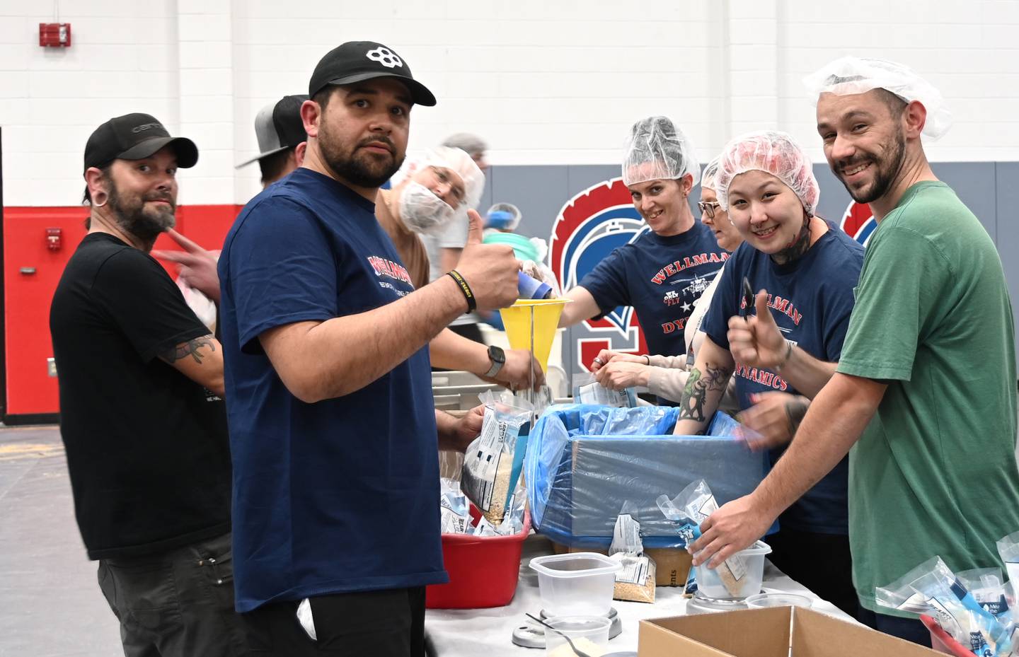 A team of Wellman Dynamics employees participate in Meals from the Heartland Wednesday.