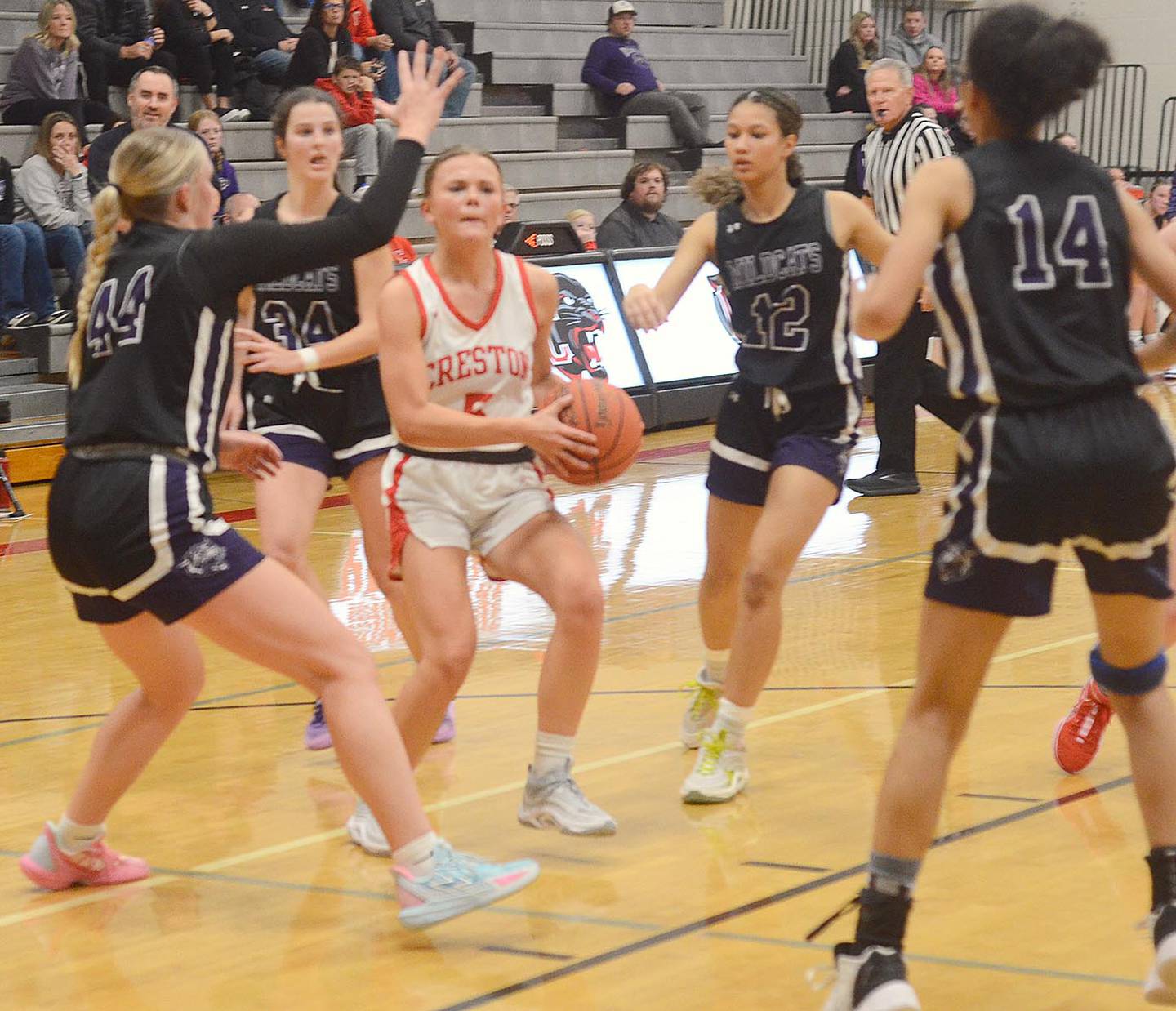 Creston guard Ava Adamson drives into a gap in the West Central Valley defense during Monday's home opener. Adamson scored eight points, including five free throws, in the 46-43 victory.