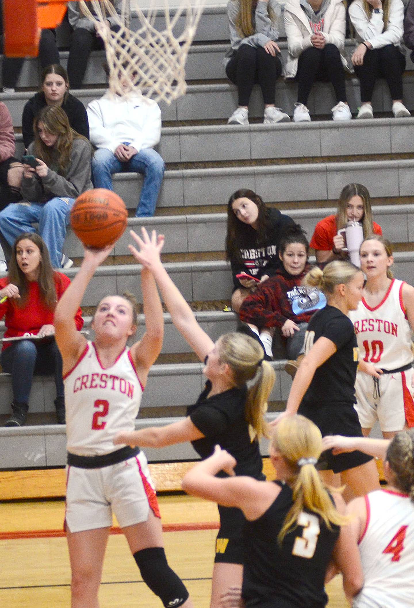 Hollyn Rieck of Creston pulls up for a short baseline jump shot against Winterset Monday night. Rieck had four points and multiple assists in the loss.