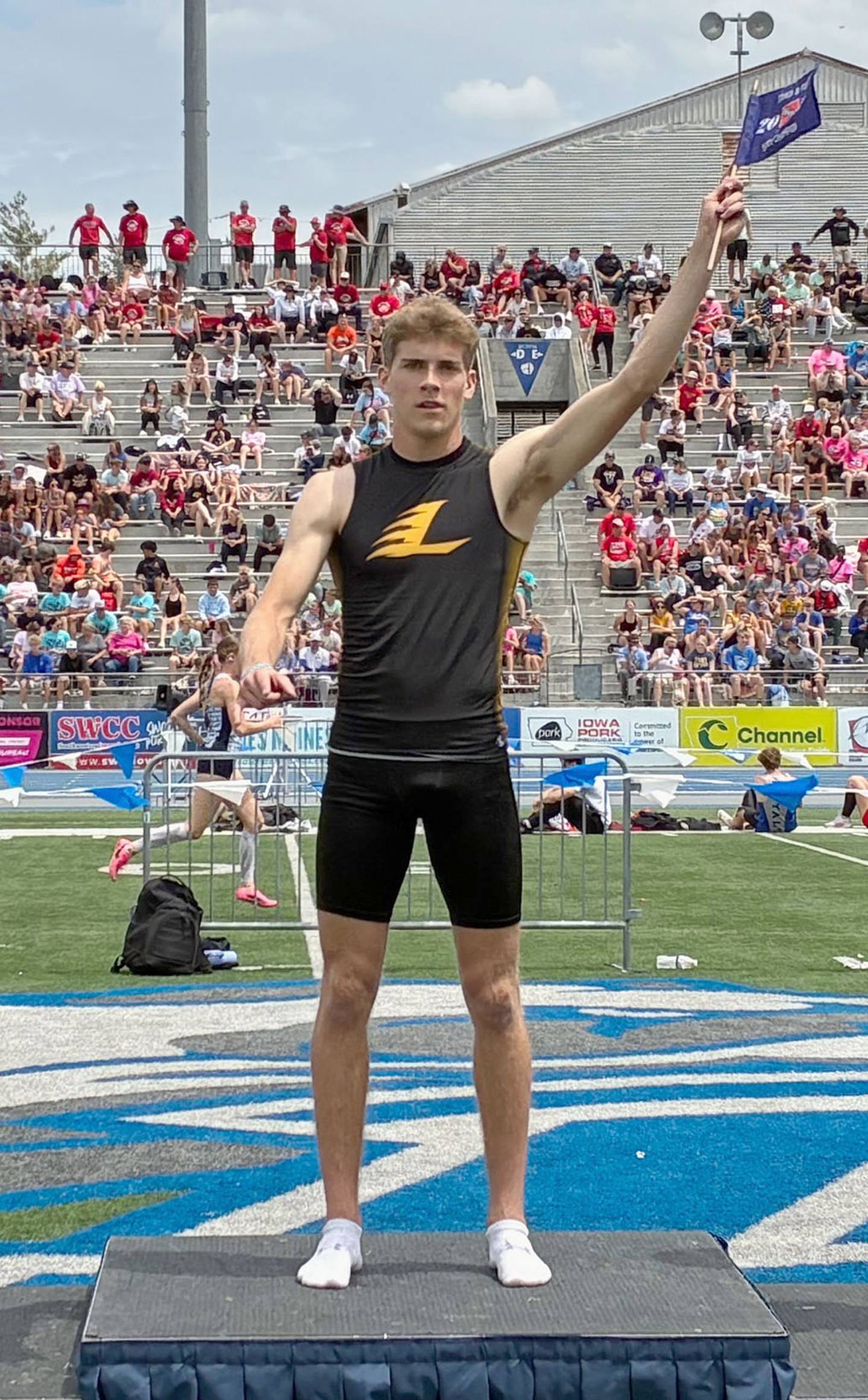 Gabe Funk of Lenox is introduced as the repeat champion in the Class 1A 110-meter hurdles Saturday at the state meet.