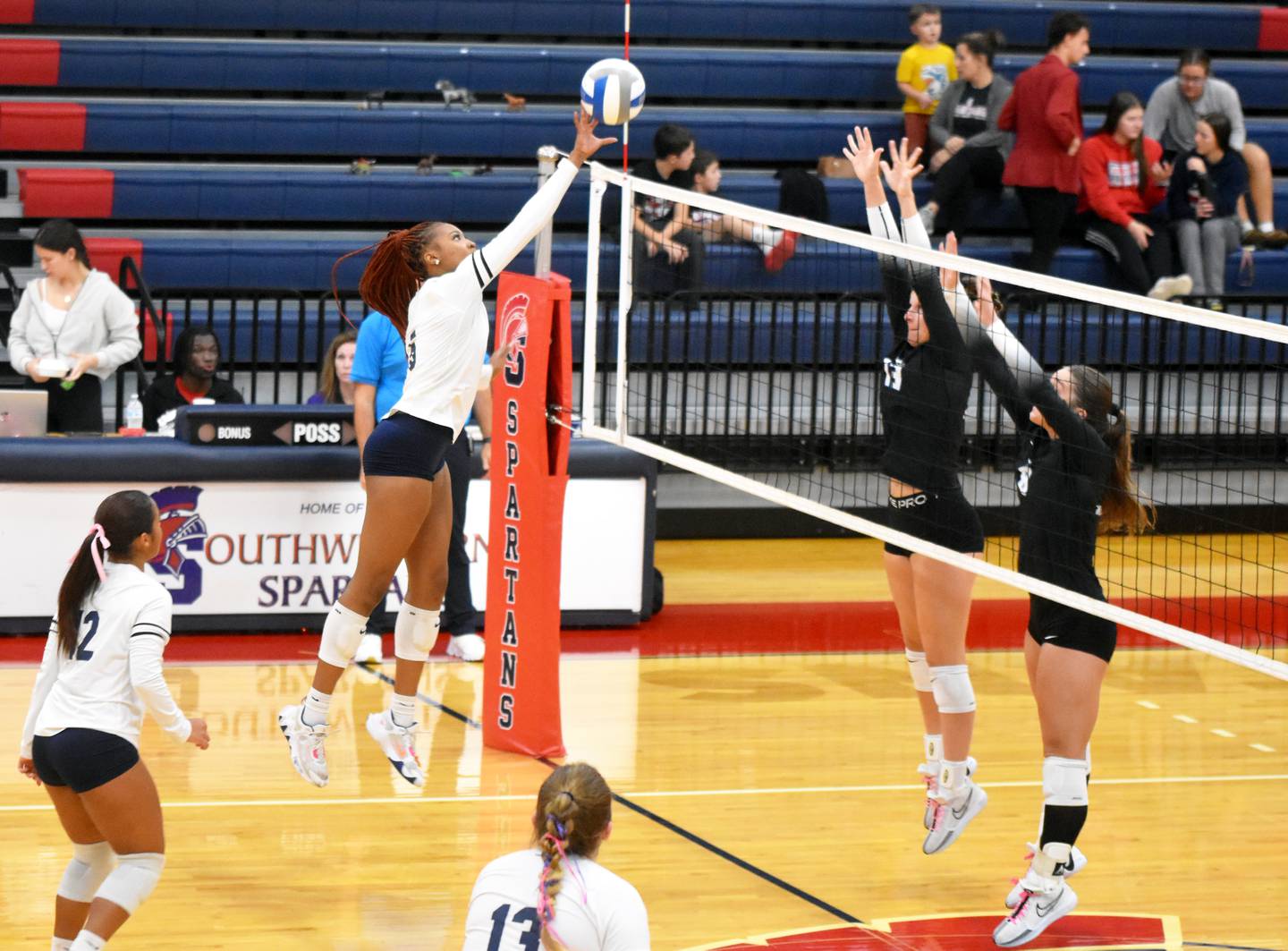 Freshman Skyelar Lawal puts up a tip against Kirkwood. Lawall had five kills and a block in the 3-0 loss.