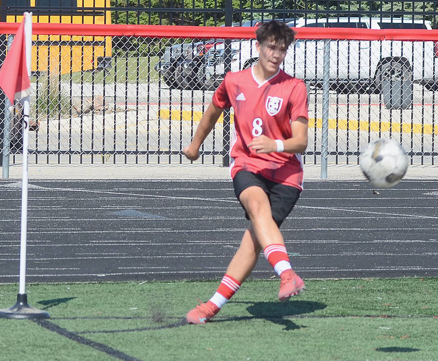 Creston sophomore Joaquin Flores completes a corner kick against Panorama in Saturday's home invitational. Flores scored two goals in the 6-2 victory.