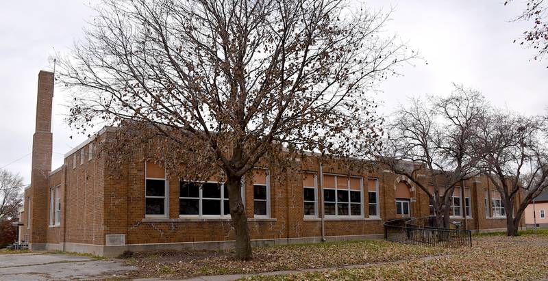 With financial support from others, Union County Economic Development Association purchases the former Lincoln School building with plans to convert the lot into housing.
