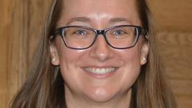 Larson goes full-time as county attorney