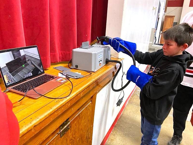 Orient-Macksburg students encounter different types of technology during a Day of Code event recently.