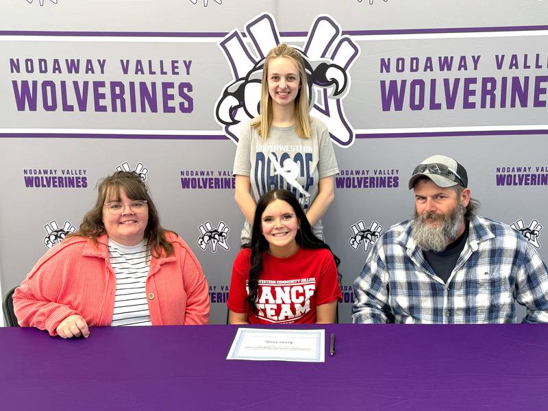 Joined by her parents, Elescia Clayton and Jerry Funke, as well as Southwestern Community College dance coach Paige Russo, Nodaway Valley senior Kenna Funke (middle) signs to dance next fall with the Spartans.