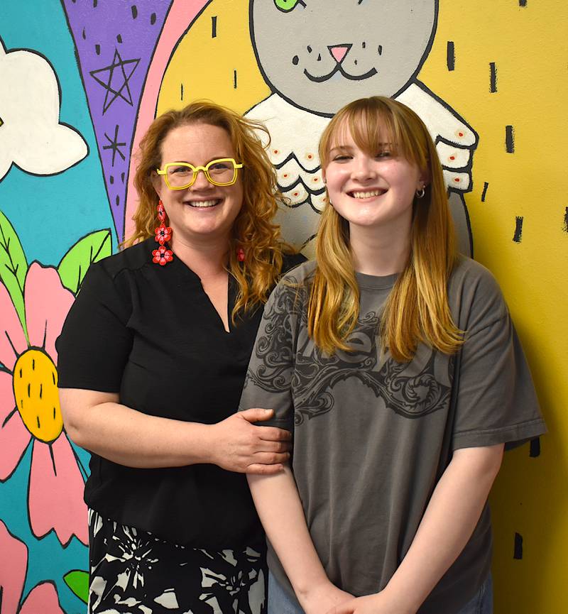 Bailey Fry-Schnormeir, left, and her daughter Leona. The two of them had work accepted into Des Moines art exhibits this month.