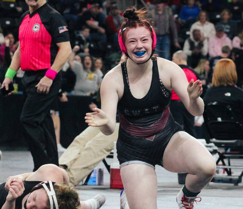 SWAT junior Stella Beattie celebrates a win during the recent girls state wrestling tournament in Coralville.