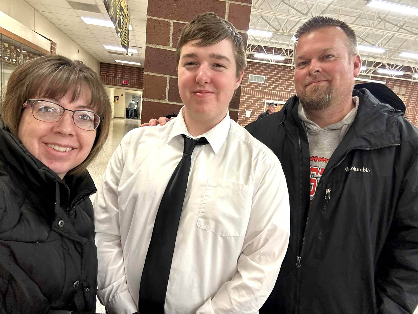 Dornack poses with his parents at Creston High School.